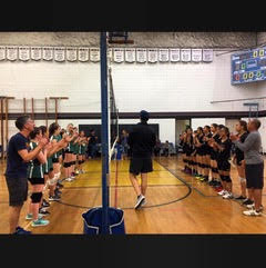 Premier League teams lined up at net showing pre-game sportsmanship