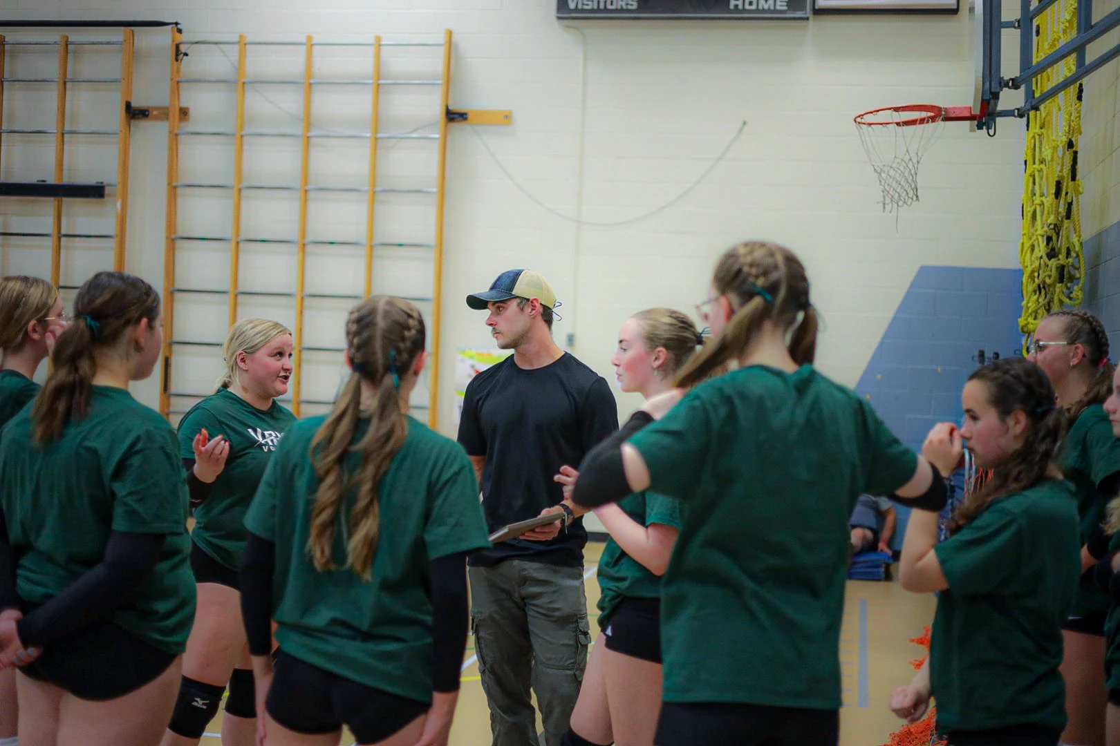 Coach developing game strategy during Premier League match