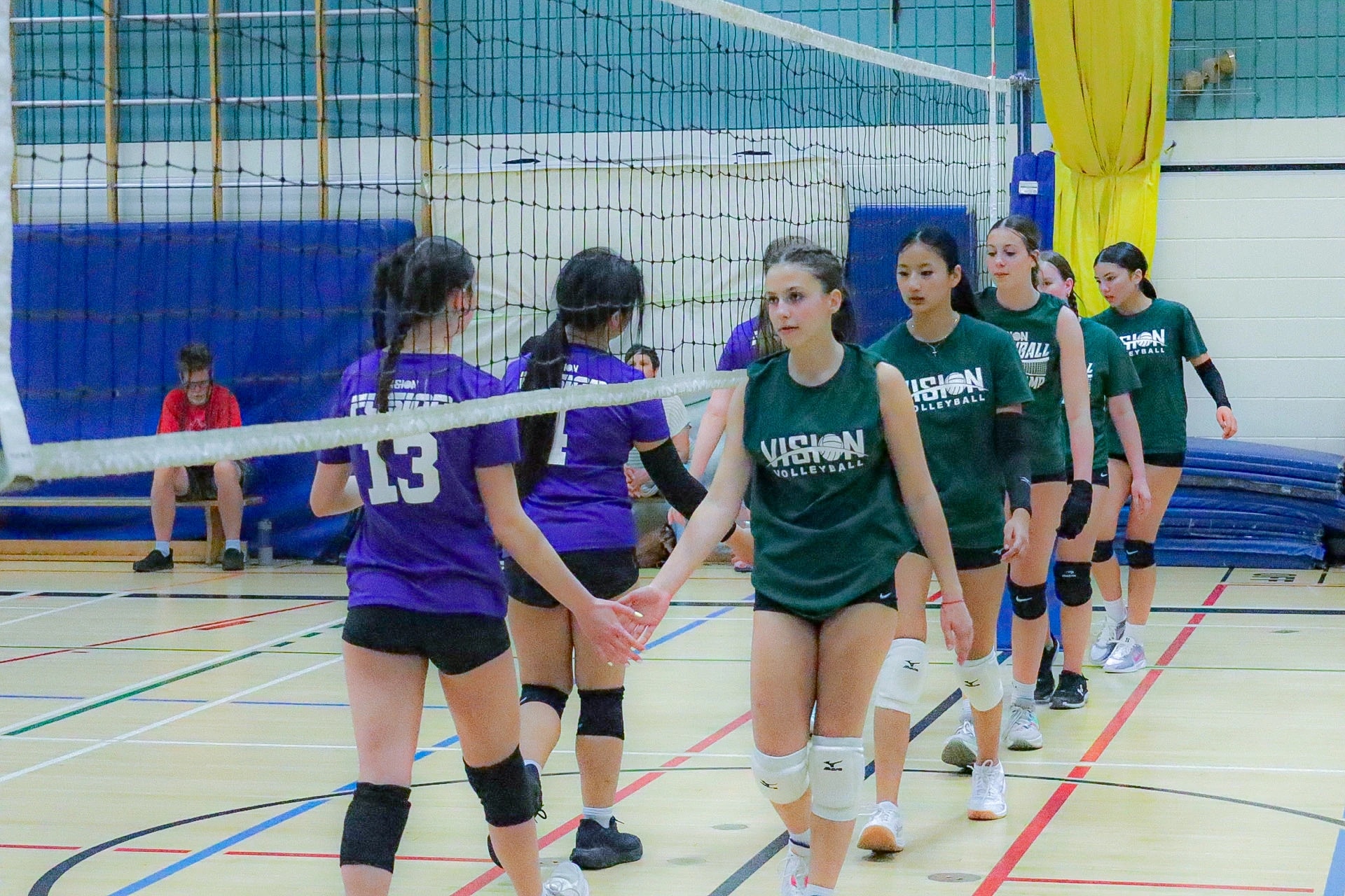 Teams demonstrating sportsmanship with handshake at Premier League