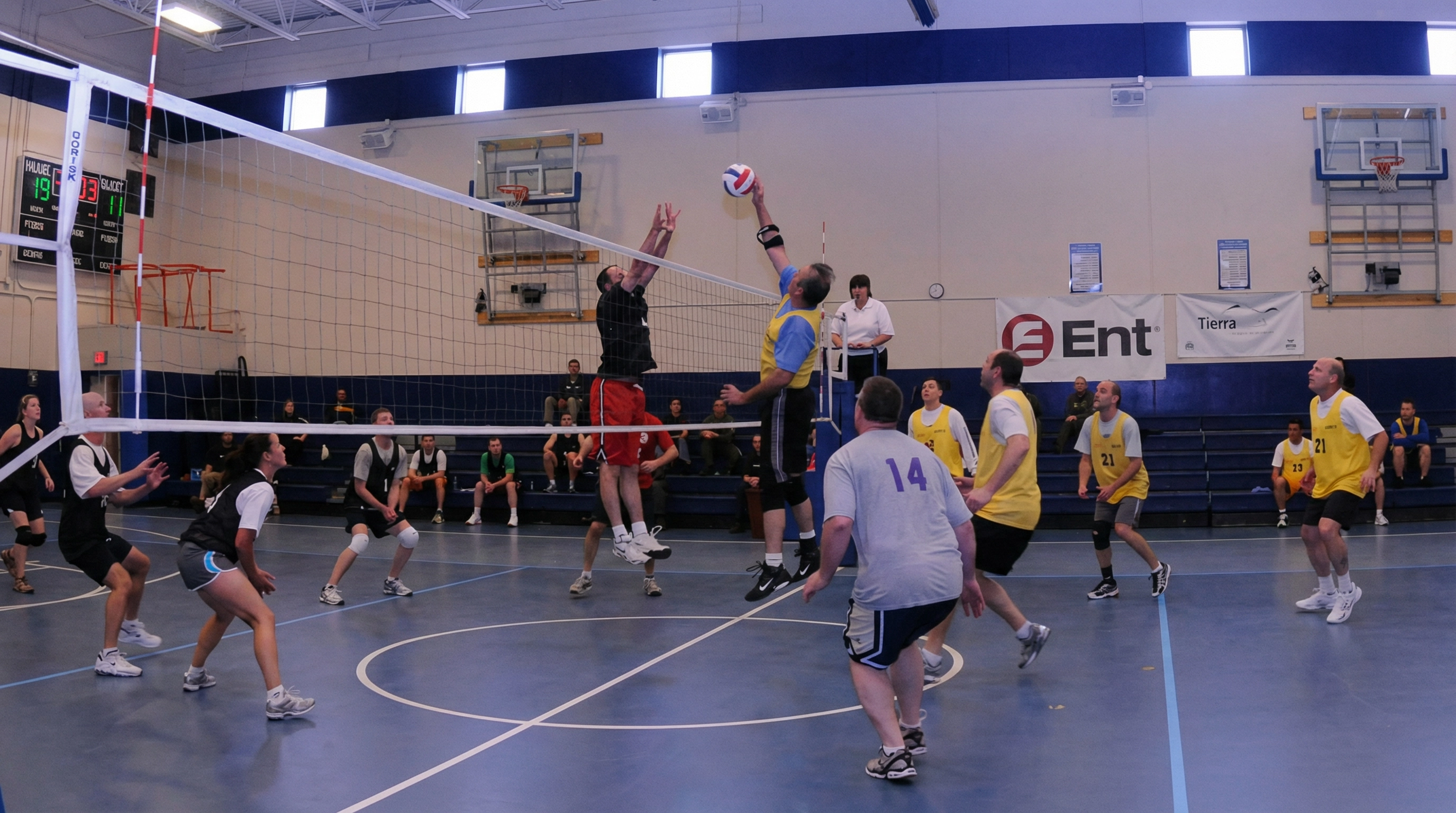 Vision Elite Academy adult volleyball players in action